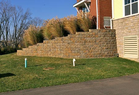 Stepping down a retaining wall
